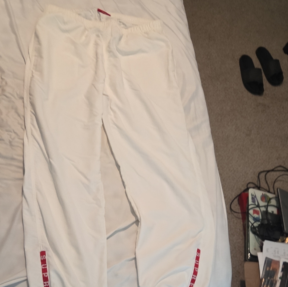 Supreme White Warmup pants with Red Accents